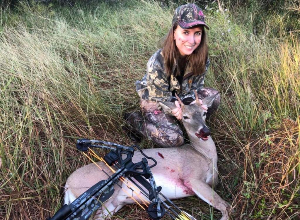jessica with a crossbow and small deer